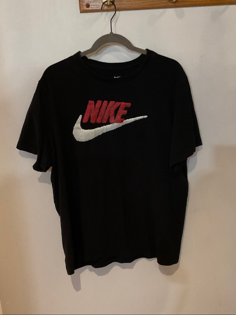 Nike Black T-Shirt with Red NIKE and White Swoosh